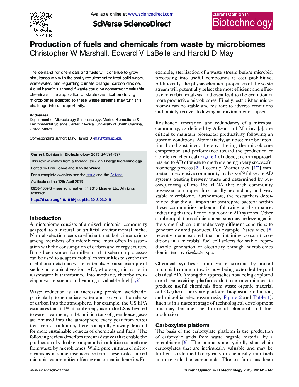 Production of fuels and chemicals from waste by microbiomes