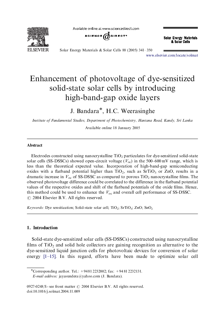 Enhancement of photovoltage of dye-sensitized solid-state solar cells by introducing high-band-gap oxide layers