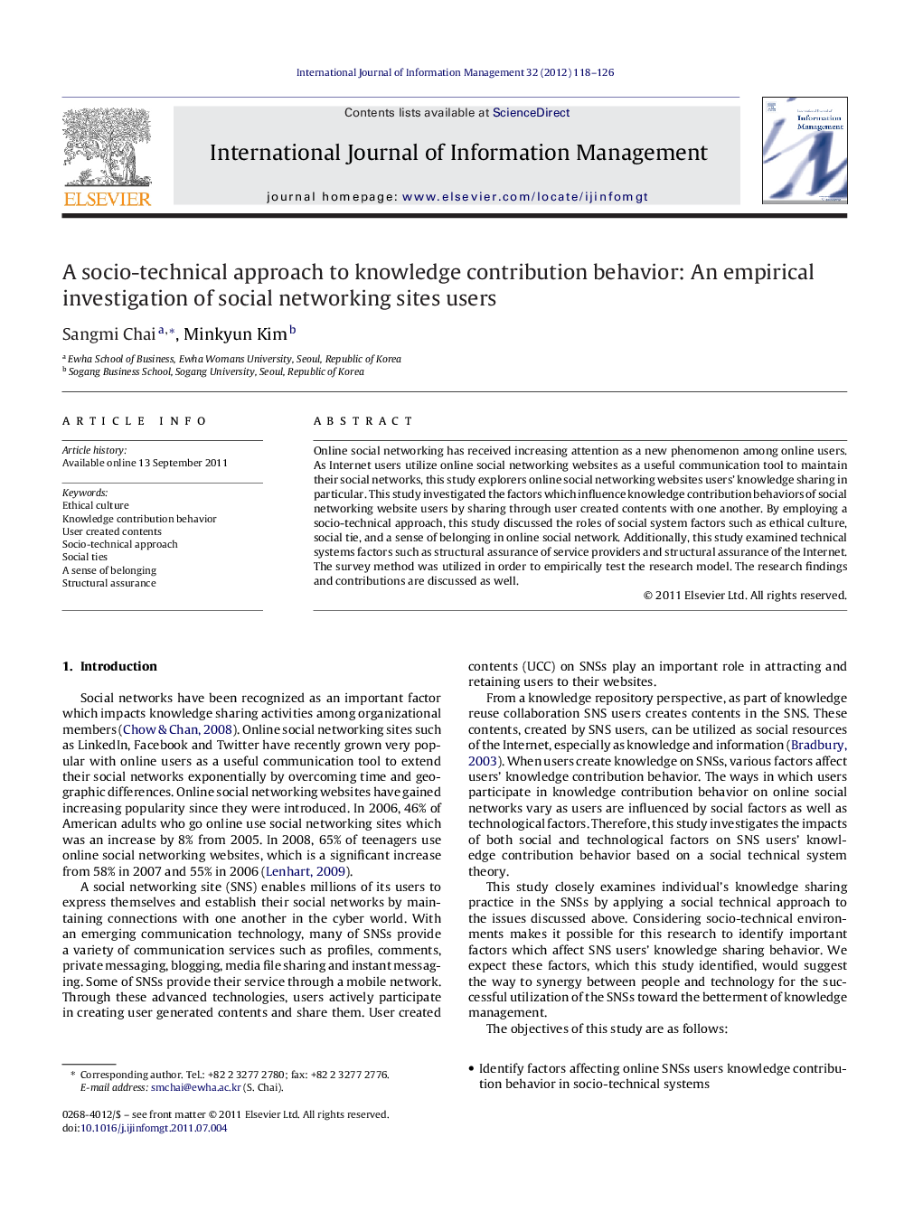 A socio-technical approach to knowledge contribution behavior: An empirical investigation of social networking sites users