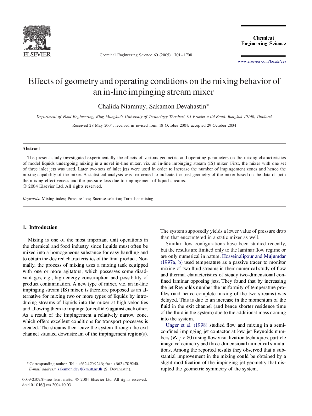 Effects of geometry and operating conditions on the mixing behavior of an in-line impinging stream mixer