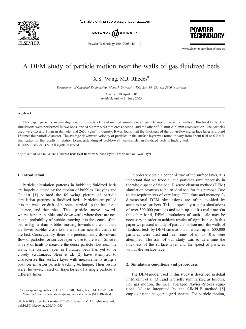 A DEM study of particle motion near the walls of gas fluidized beds