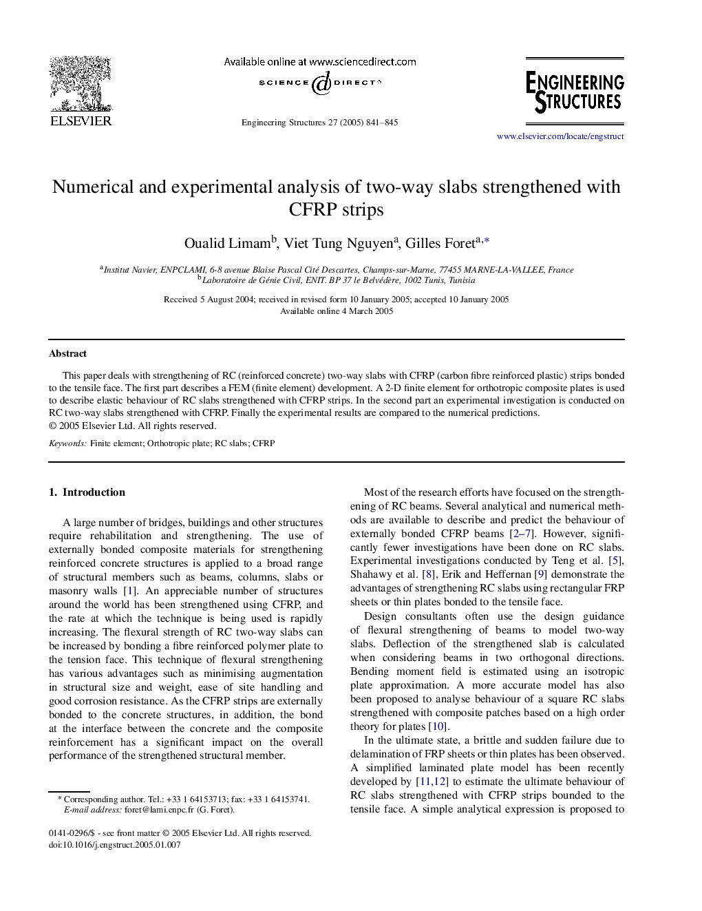 Numerical and experimental analysis of two-way slabs strengthened with CFRP strips