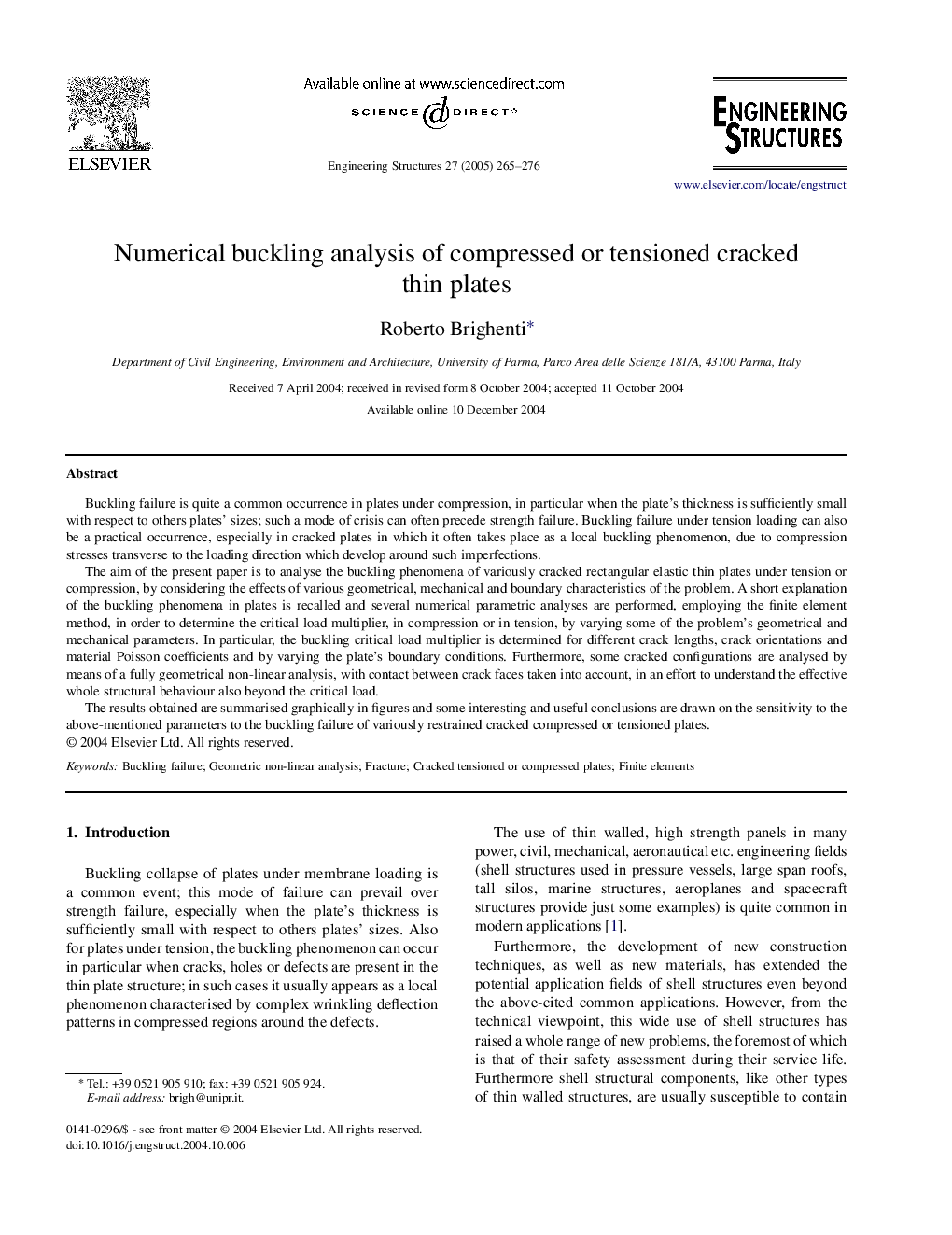 Numerical buckling analysis of compressed or tensioned cracked thin plates