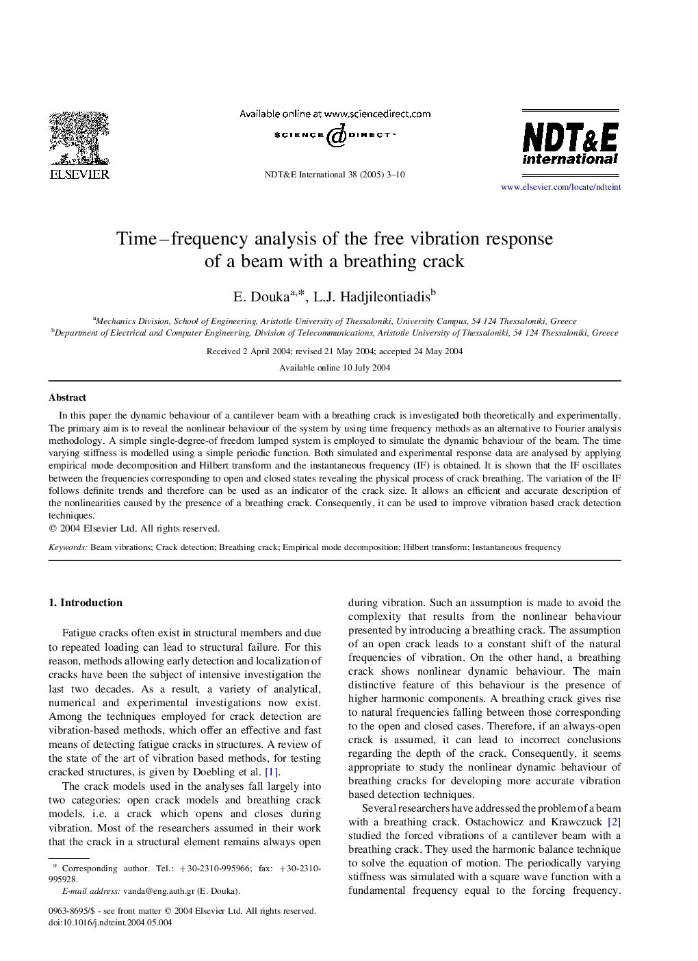 Time-frequency analysis of the free vibration response of a beam with a breathing crack