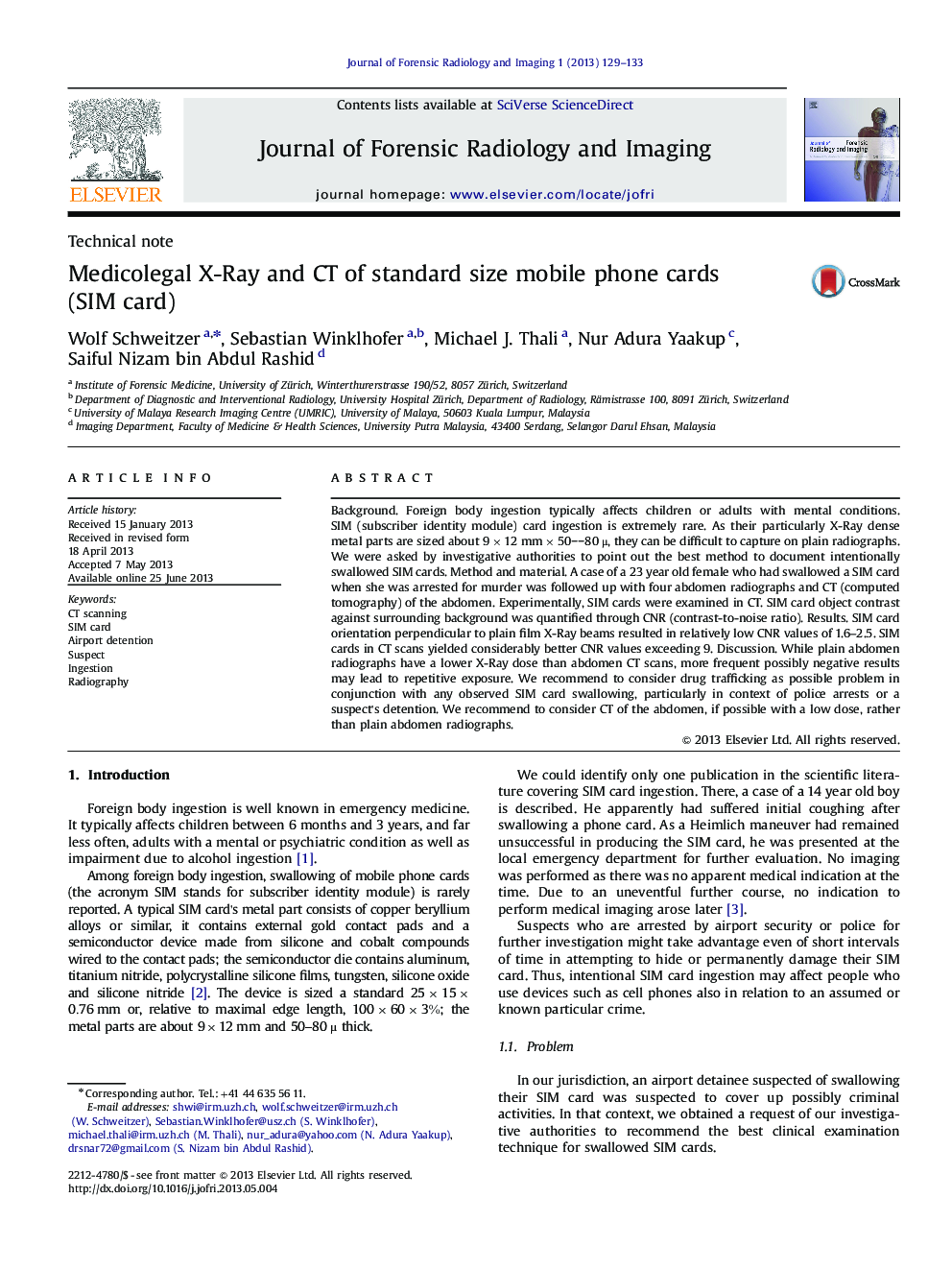 Medicolegal X-Ray and CT of standard size mobile phone cards (SIM card)