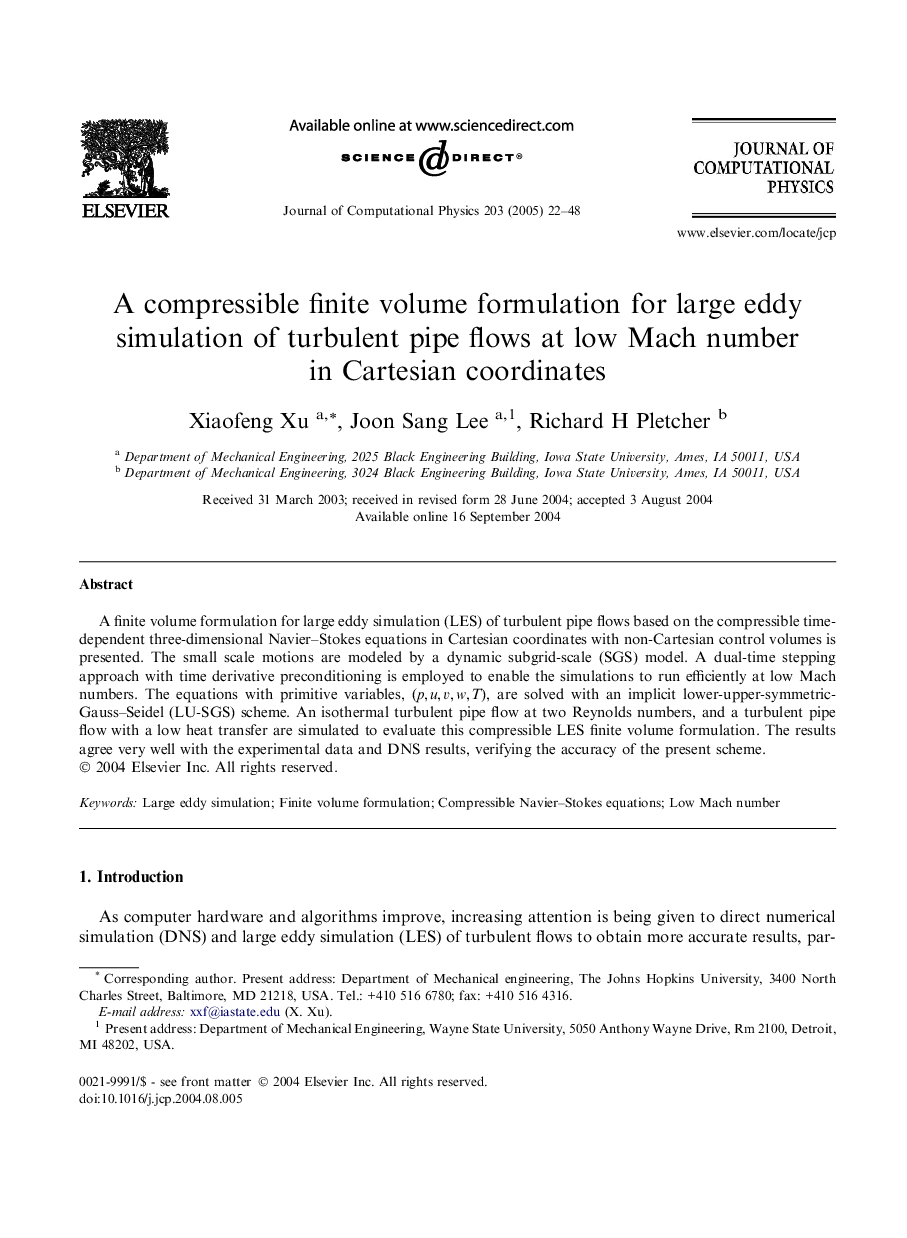 A compressible finite volume formulation for large eddy simulation of turbulent pipe flows at low Mach number in Cartesian coordinates