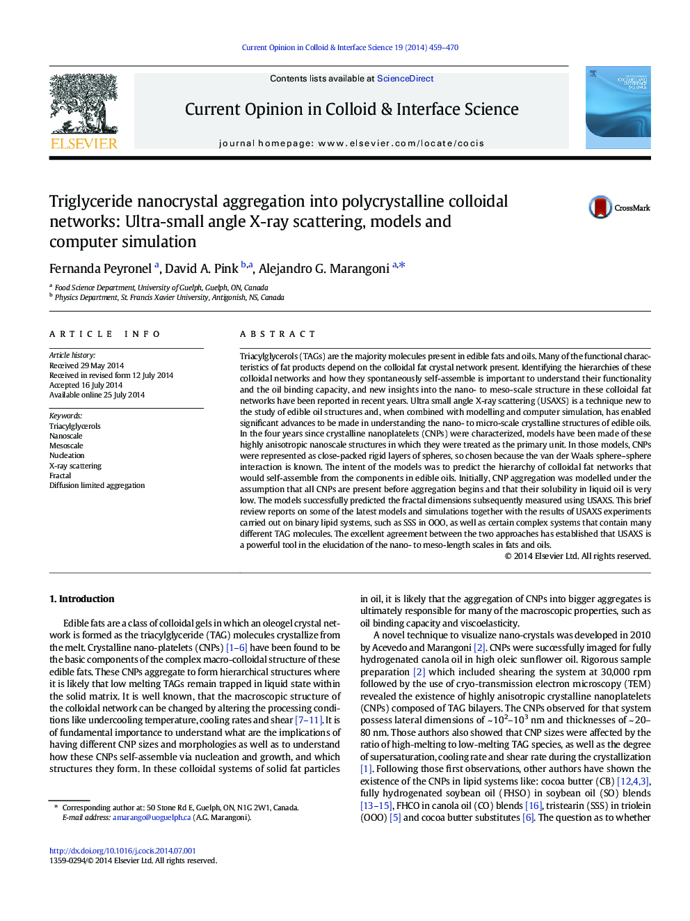 Triglyceride nanocrystal aggregation into polycrystalline colloidal networks: Ultra-small angle X-ray scattering, models and computer simulation