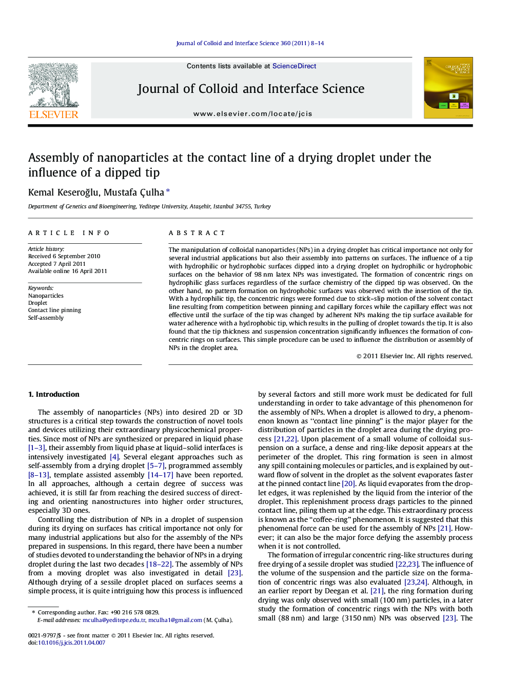 Assembly of nanoparticles at the contact line of a drying droplet under the influence of a dipped tip