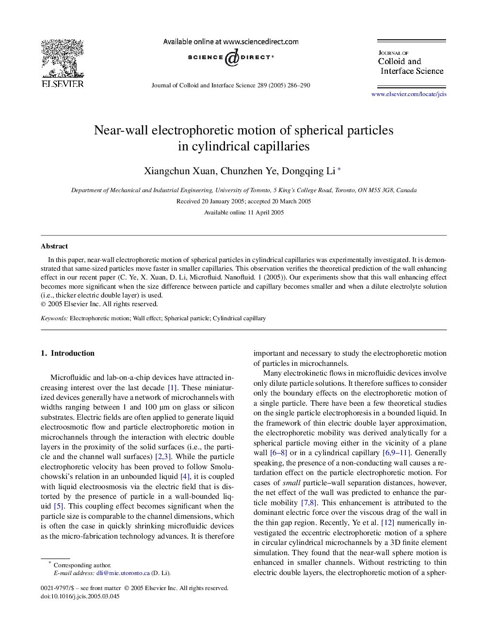 Near-wall electrophoretic motion of spherical particles in cylindrical capillaries