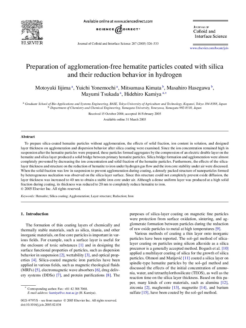 Preparation of agglomeration-free hematite particles coated with silica and their reduction behavior in hydrogen