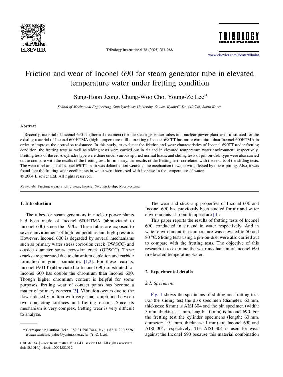 Friction and wear of Inconel 690 for steam generator tube in elevated temperature water under fretting condition