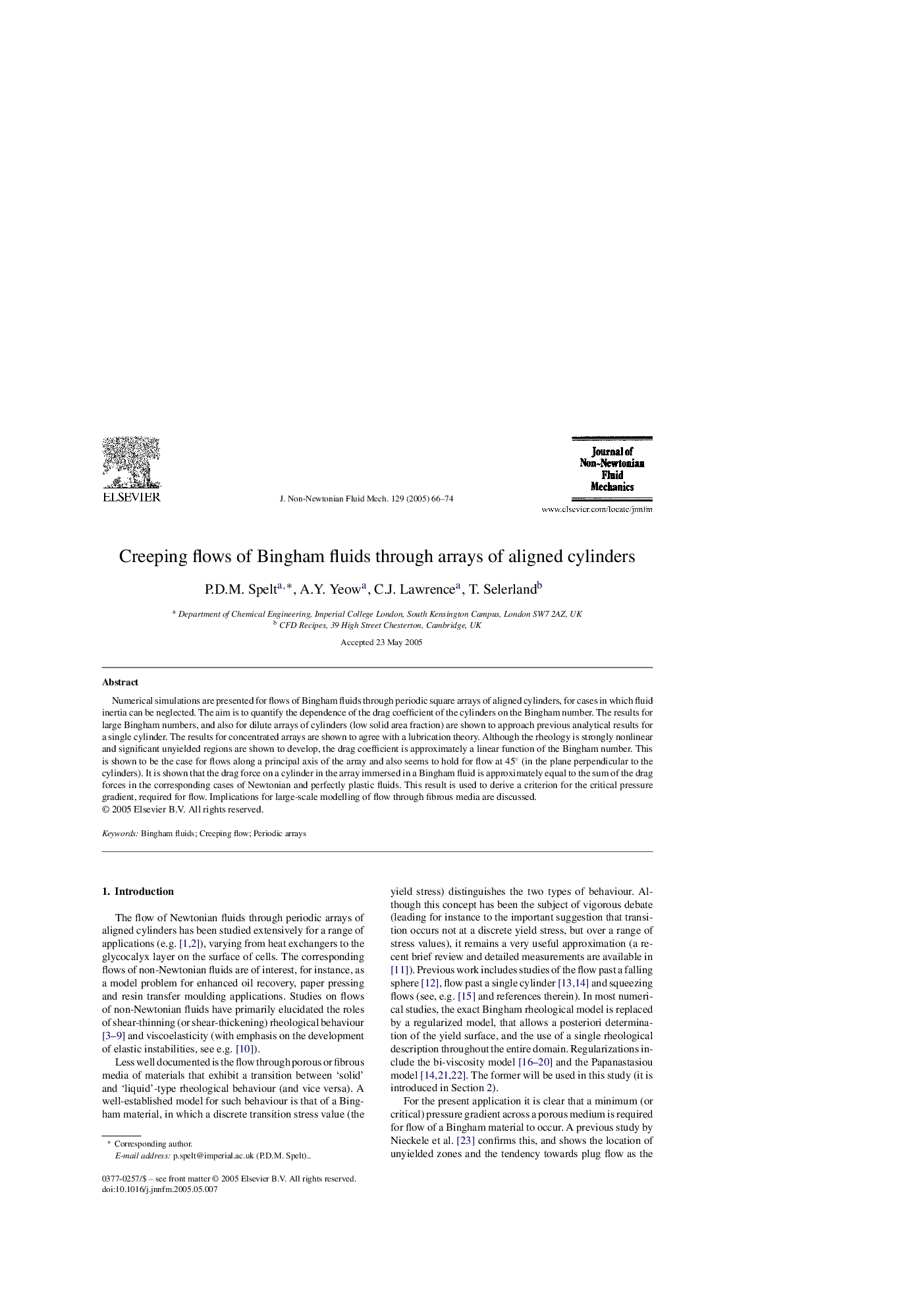 Creeping flows of Bingham fluids through arrays of aligned cylinders