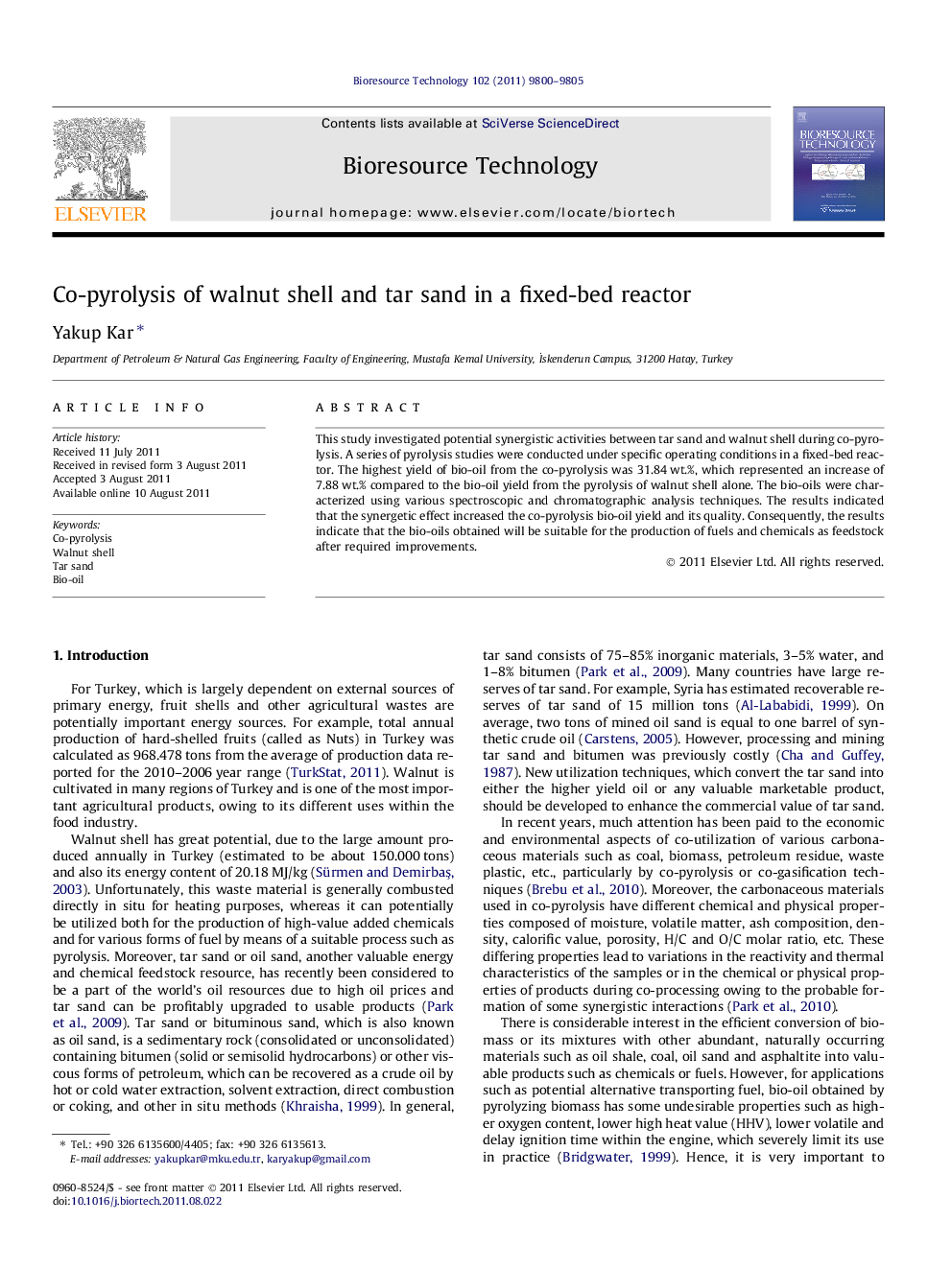 Co-pyrolysis of walnut shell and tar sand in a fixed-bed reactor