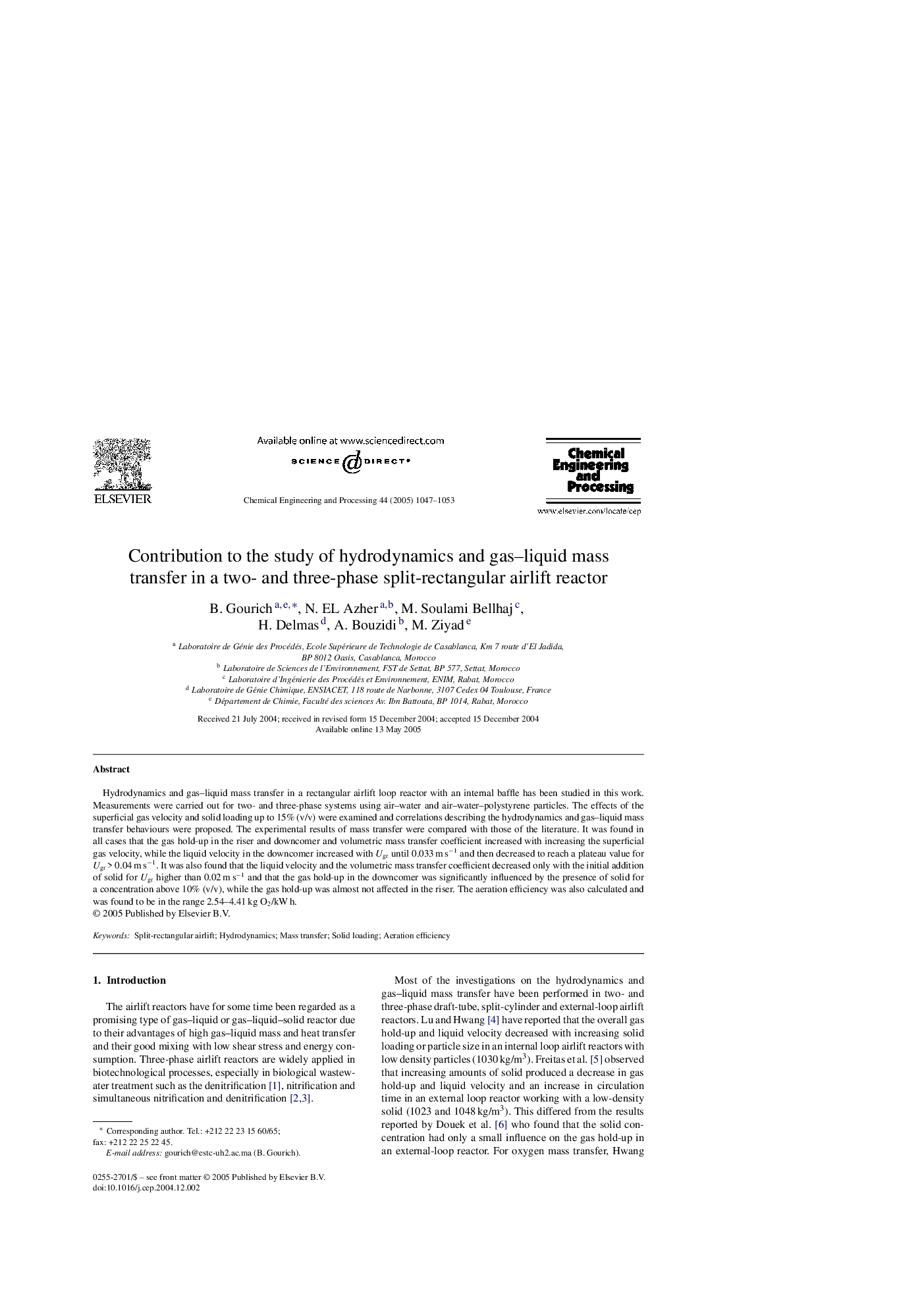 Contribution to the study of hydrodynamics and gas-liquid mass transfer in a two- and three-phase split-rectangular airlift reactor