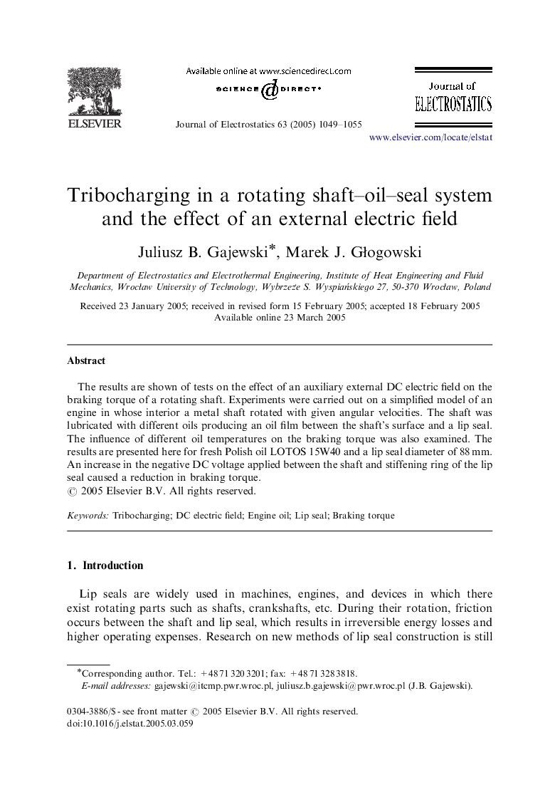 Tribocharging in a rotating shaft-oil-seal system and the effect of an external electric field