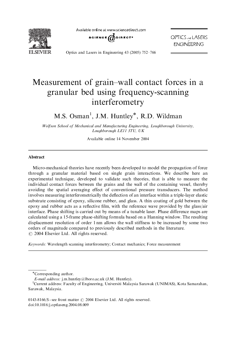 Measurement of grain-wall contact forces in a granular bed using frequency-scanning interferometry