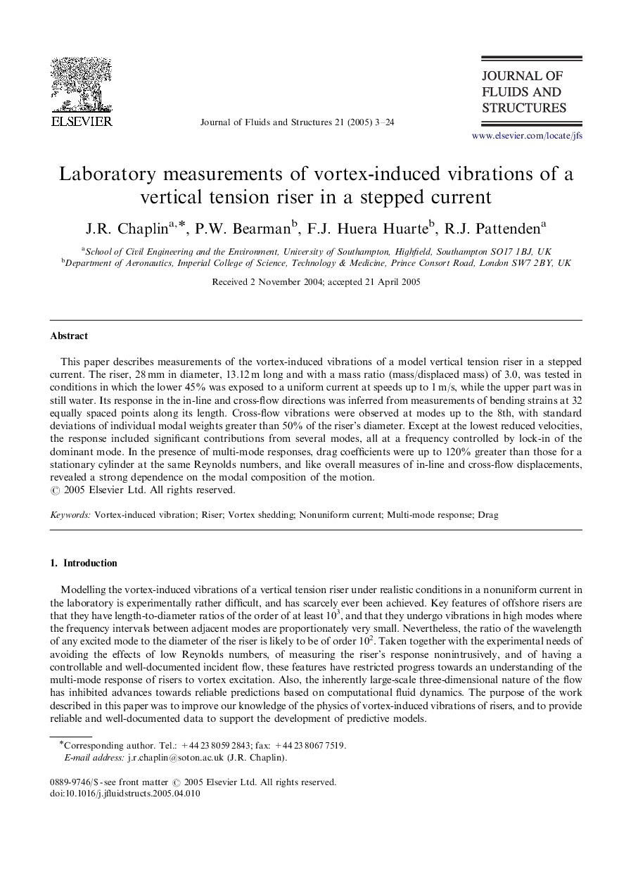 Laboratory measurements of vortex-induced vibrations of a vertical tension riser in a stepped current