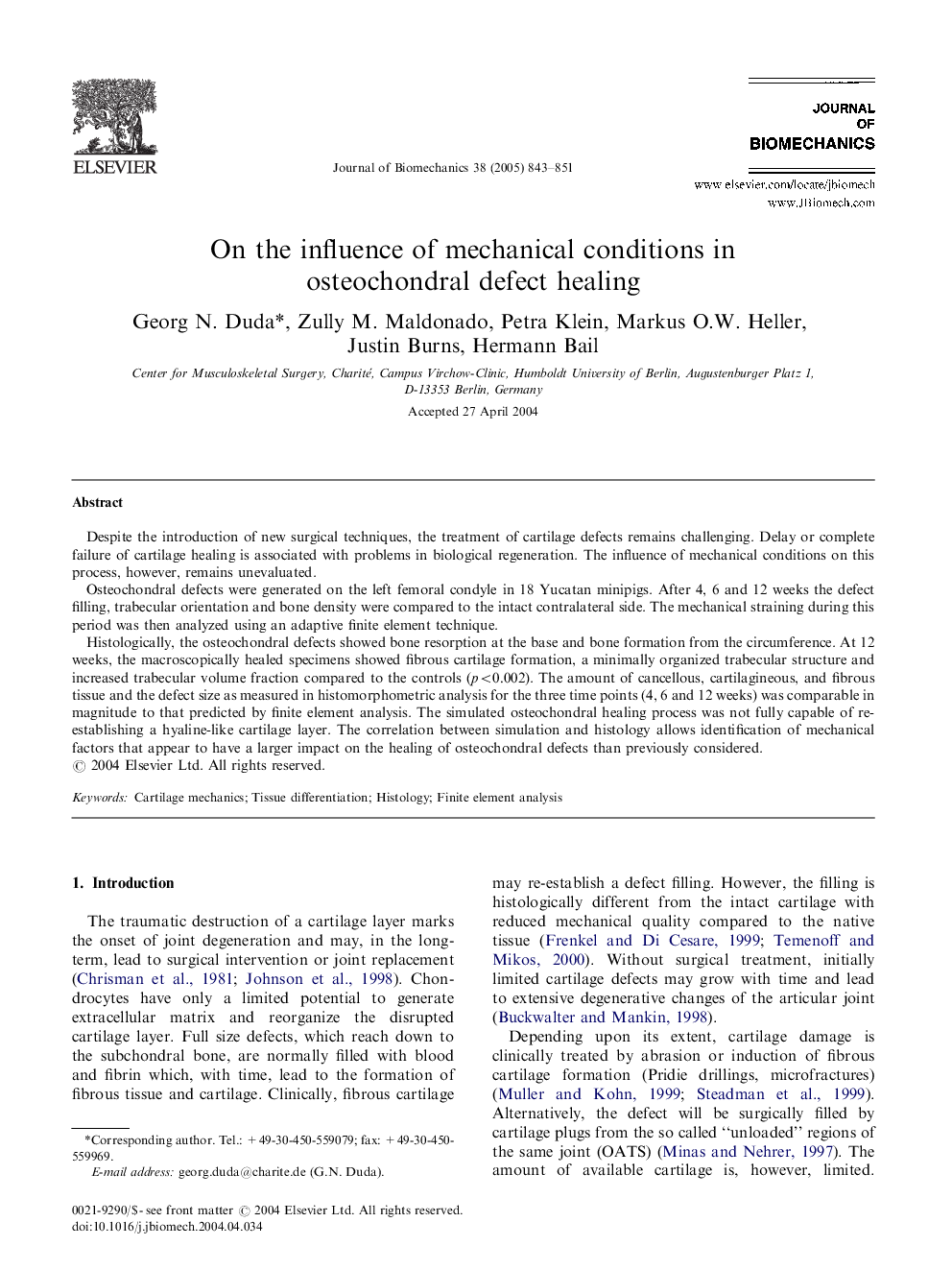 On the influence of mechanical conditions in osteochondral defect healing