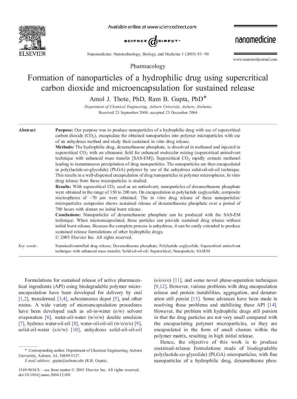 Formation of nanoparticles of a hydrophilic drug using supercritical carbon dioxide and microencapsulation for sustained release