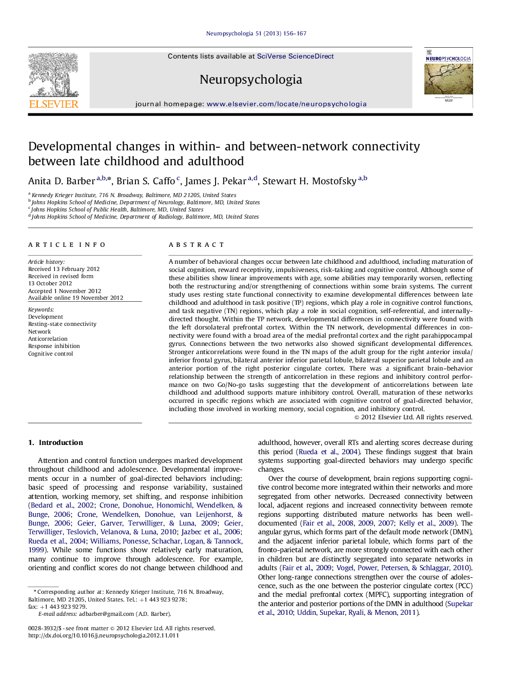 Developmental changes in within- and between-network connectivity between late childhood and adulthood