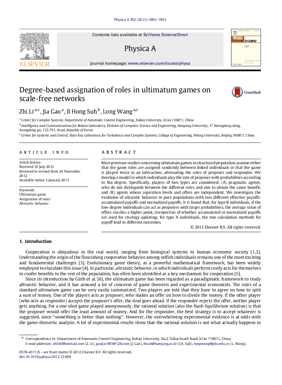 Degree-based assignation of roles in ultimatum games on scale-free networks