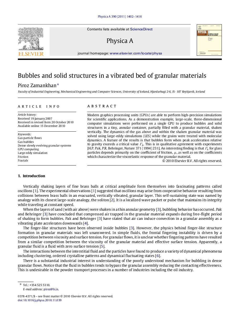 Bubbles and solid structures in a vibrated bed of granular materials