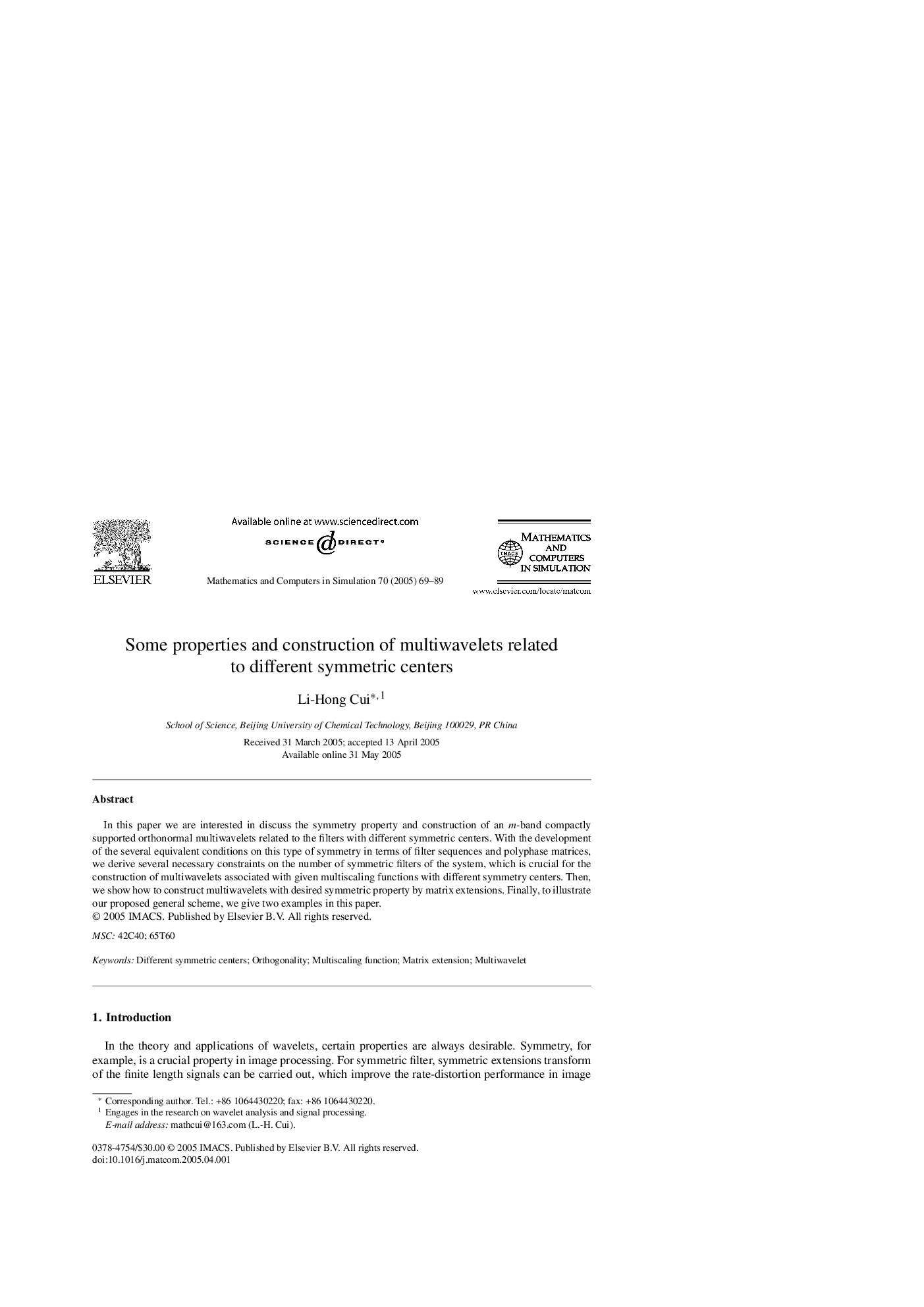 Some properties and construction of multiwavelets related to different symmetric centers