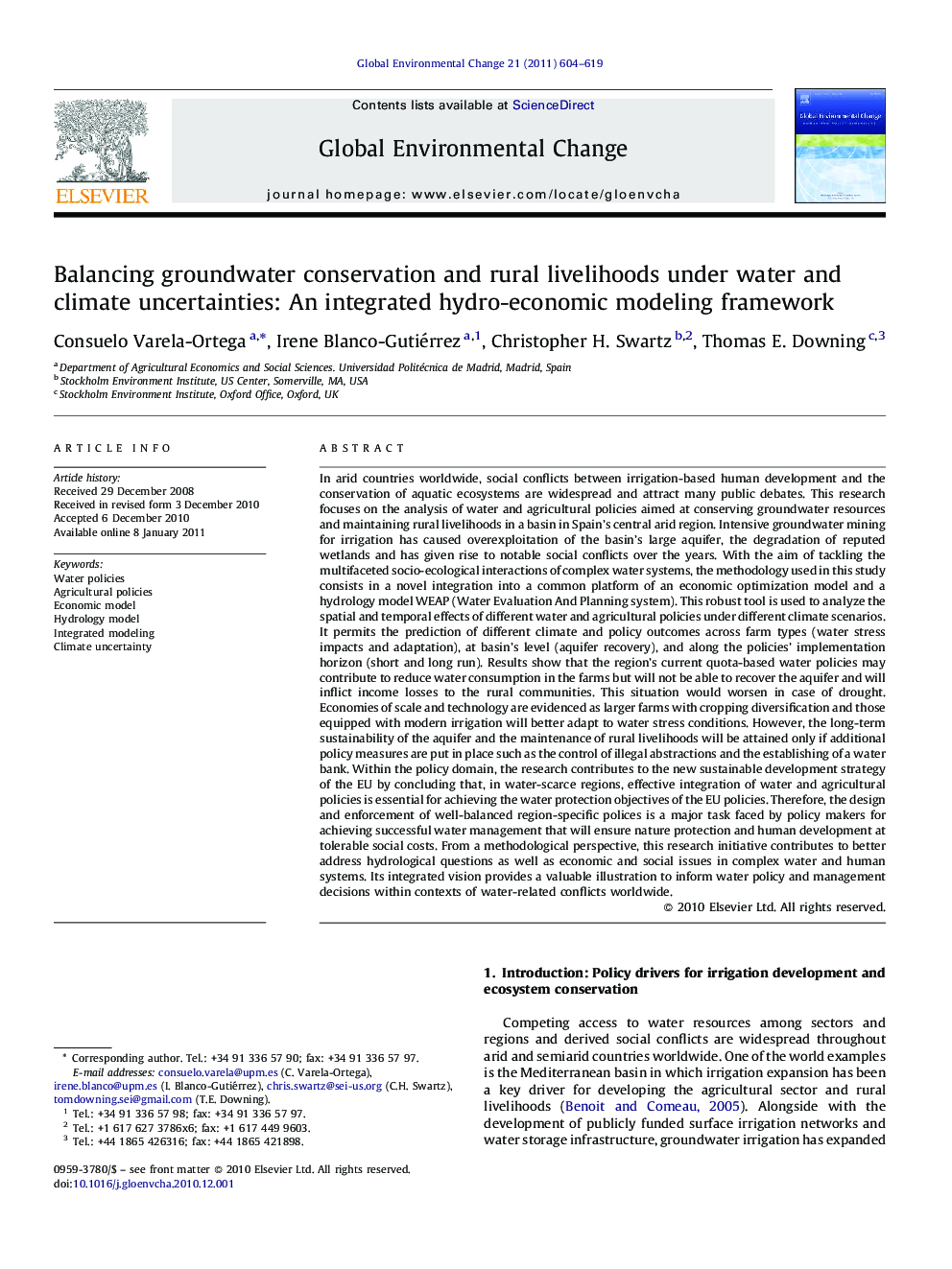 Balancing groundwater conservation and rural livelihoods under water and climate uncertainties: An integrated hydro-economic modeling framework