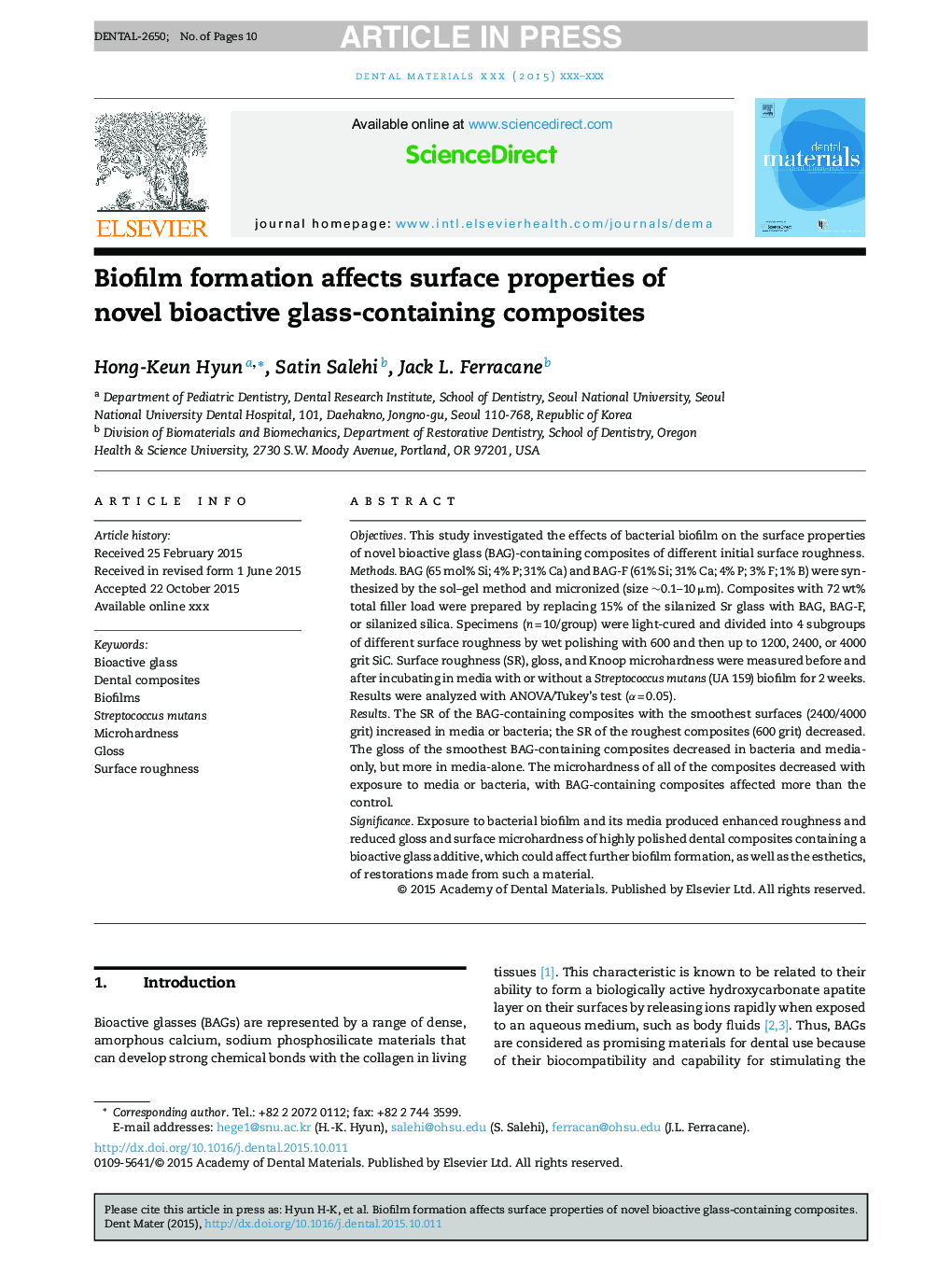 Biofilm formation affects surface properties of novel bioactive glass-containing composites