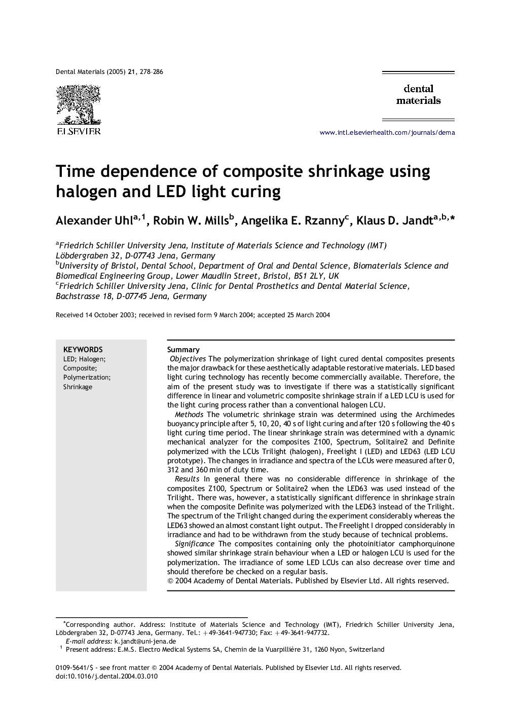 Time dependence of composite shrinkage using halogen and LED light curing