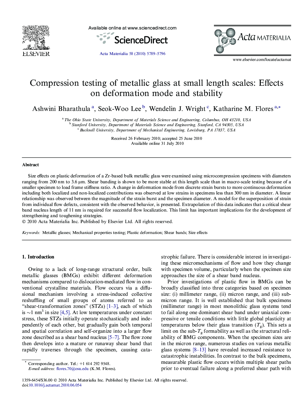 Compression testing of metallic glass at small length scales: Effects on deformation mode and stability