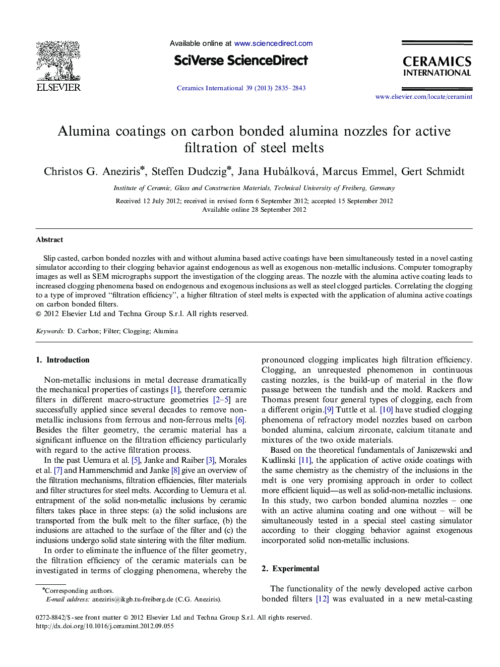 Alumina coatings on carbon bonded alumina nozzles for active filtration of steel melts