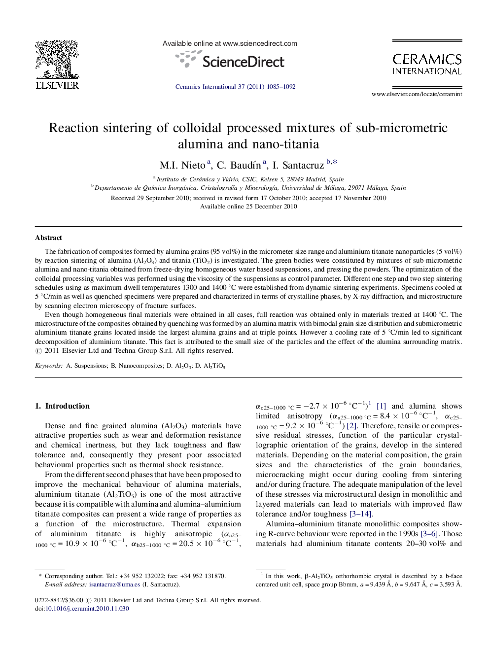 Reaction sintering of colloidal processed mixtures of sub-micrometric alumina and nano-titania