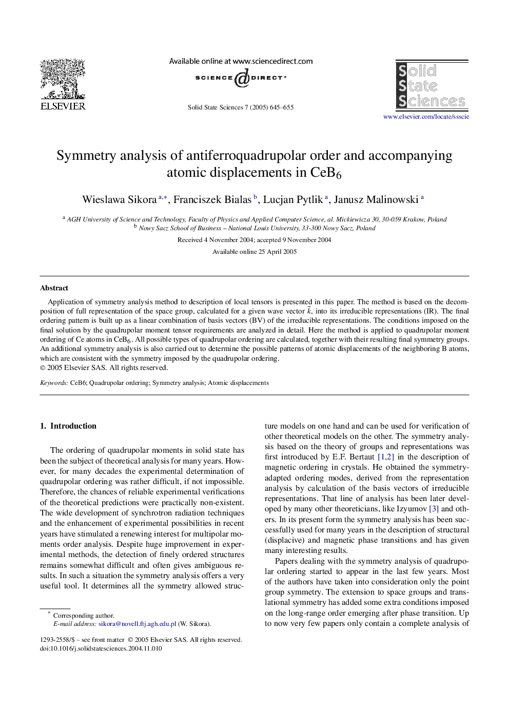 Symmetry analysis of antiferroquadrupolar order and accompanying atomic displacements in CeB6