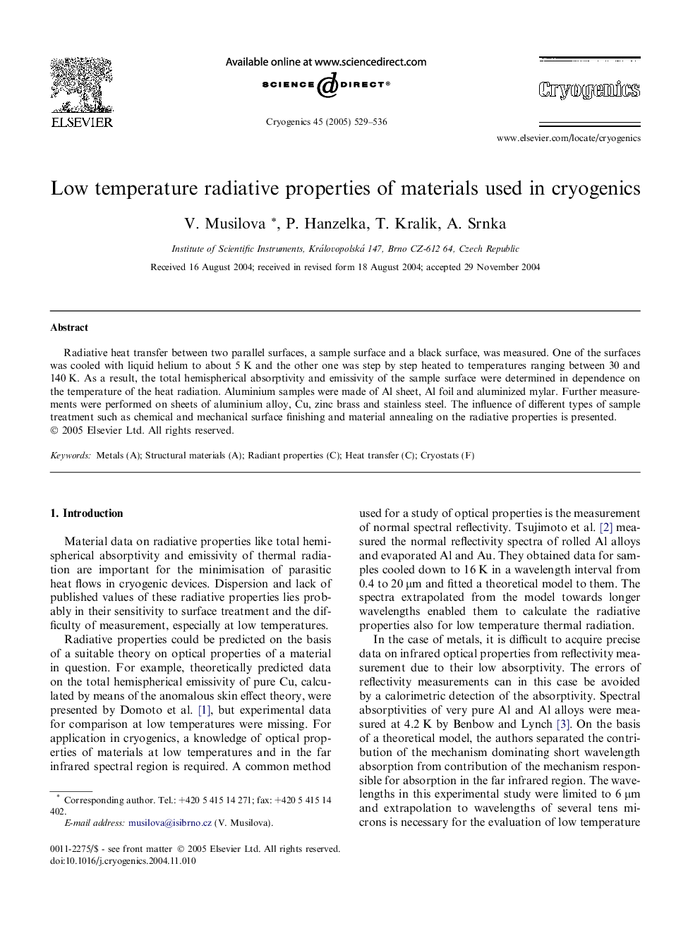 Low temperature radiative properties of materials used in cryogenics