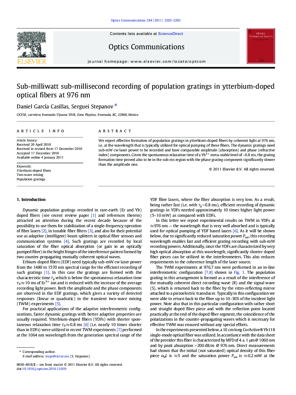 Sub-milliwatt sub-millisecond recording of population gratings in ytterbium-doped optical fibers at 976Â nm