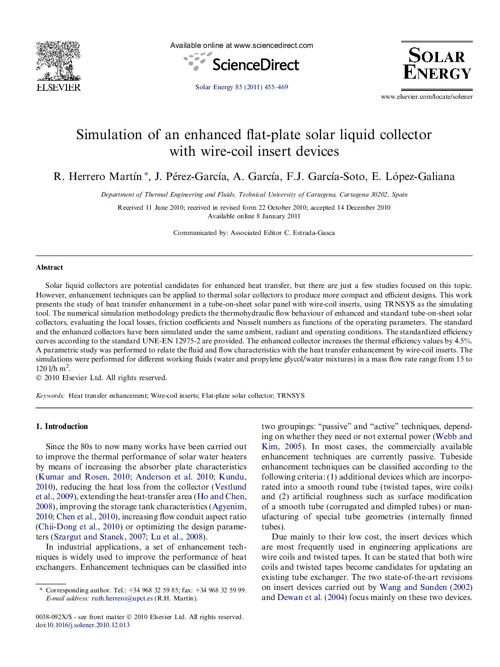 Simulation of an enhanced flat-plate solar liquid collector with wire-coil insert devices