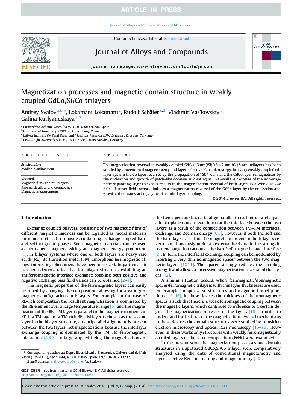 Magnetization processes and magnetic domain structure in weakly coupled GdCo/Si/Co trilayers