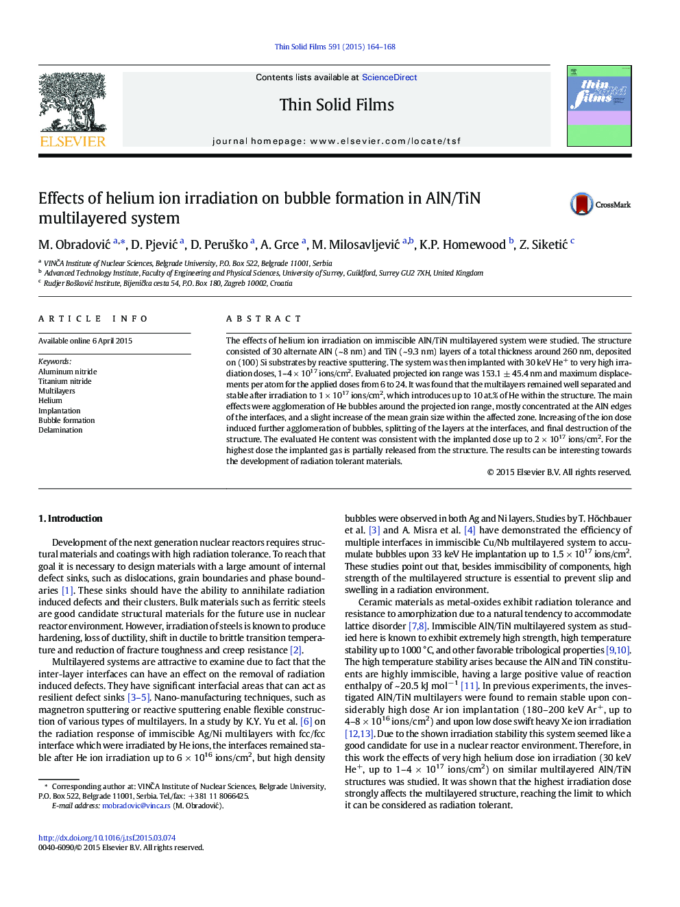 Effects of helium ion irradiation on bubble formation in AlN/TiN multilayered system