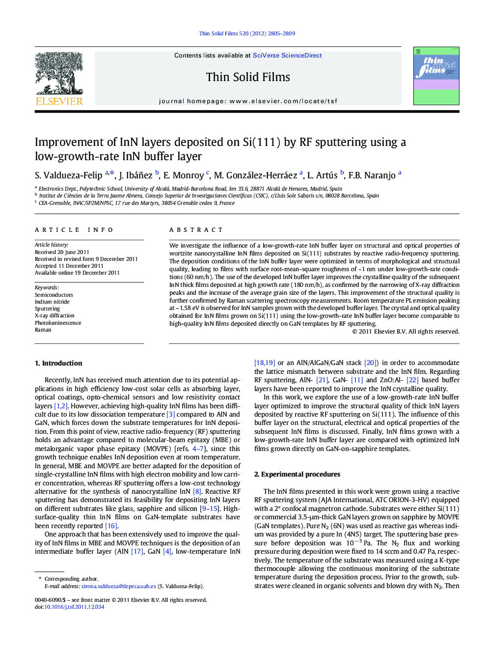 Improvement of InN layers deposited on Si(111) by RF sputtering using a low-growth-rate InN buffer layer