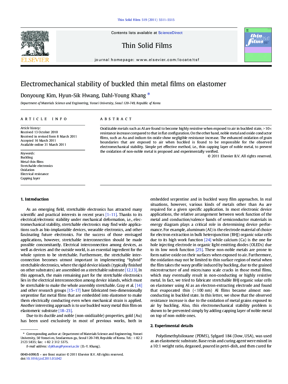 Electromechanical stability of buckled thin metal films on elastomer