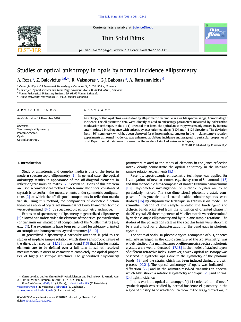 Studies of optical anisotropy in opals by normal incidence ellipsometry