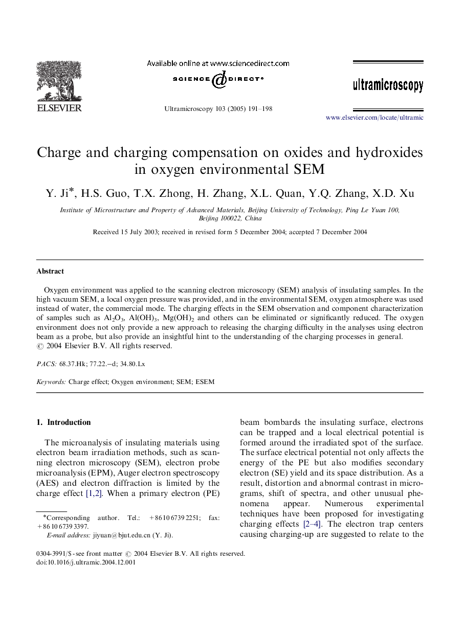 Charge and charging compensation on oxides and hydroxides in oxygen environmental SEM