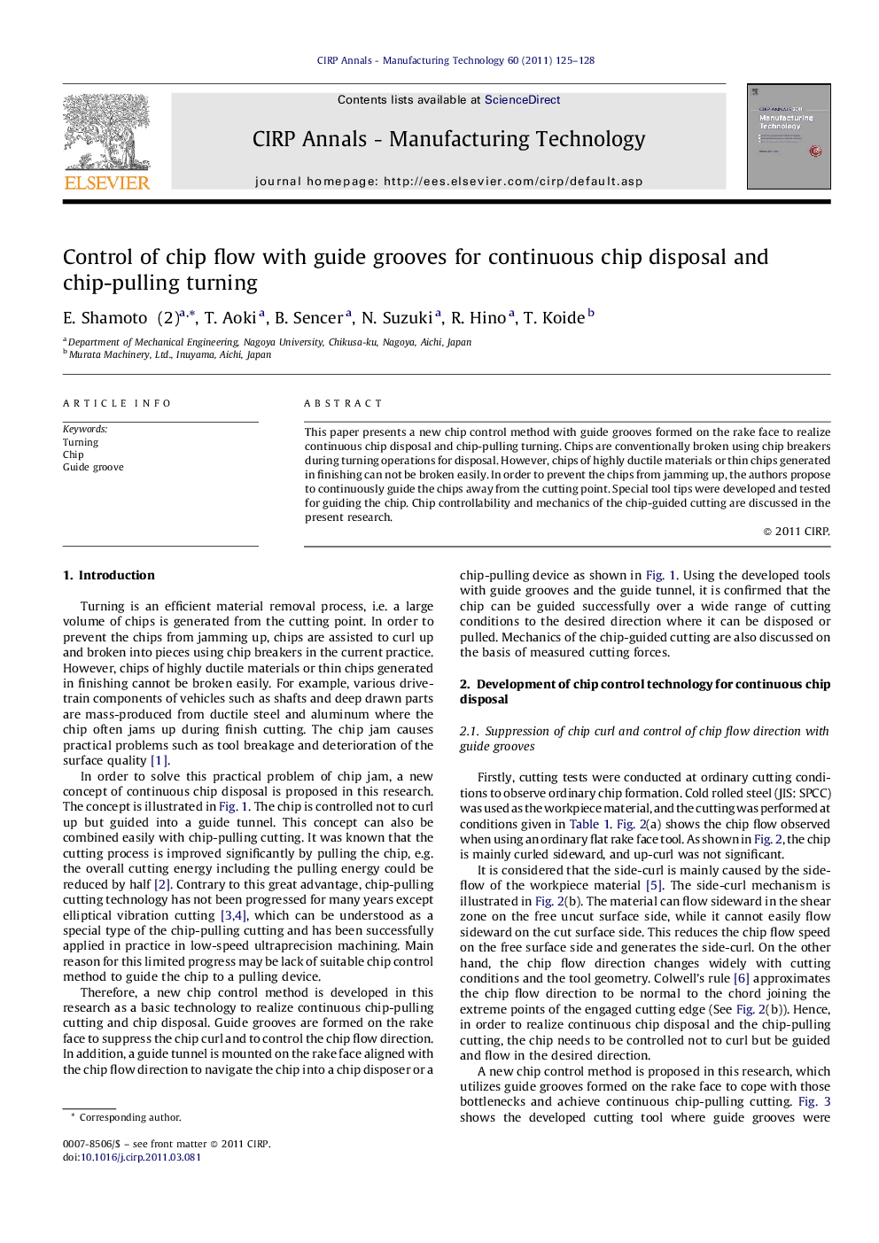 Control of chip flow with guide grooves for continuous chip disposal and chip-pulling turning