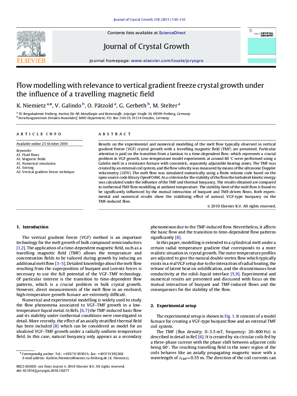 Flow modelling with relevance to vertical gradient freeze crystal growth under the influence of a travelling magnetic field