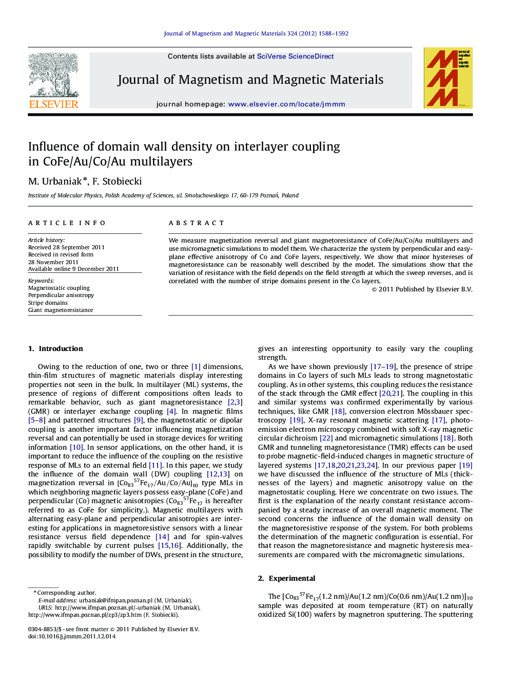 Influence of domain wall density on interlayer coupling in CoFe/Au/Co/Au multilayers