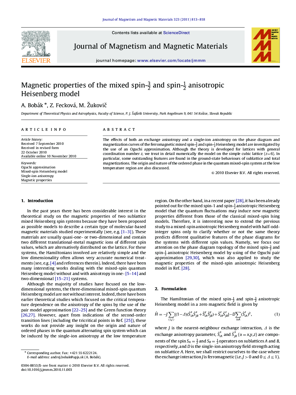 Magnetic properties of the mixed spin-32 and spin-12 anisotropic Heisenberg model