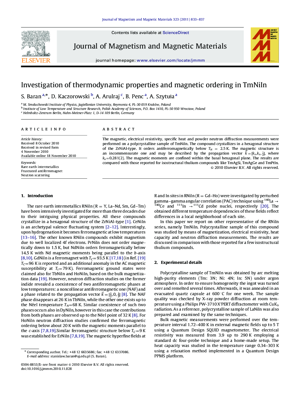 Investigation of thermodynamic properties and magnetic ordering in TmNiIn