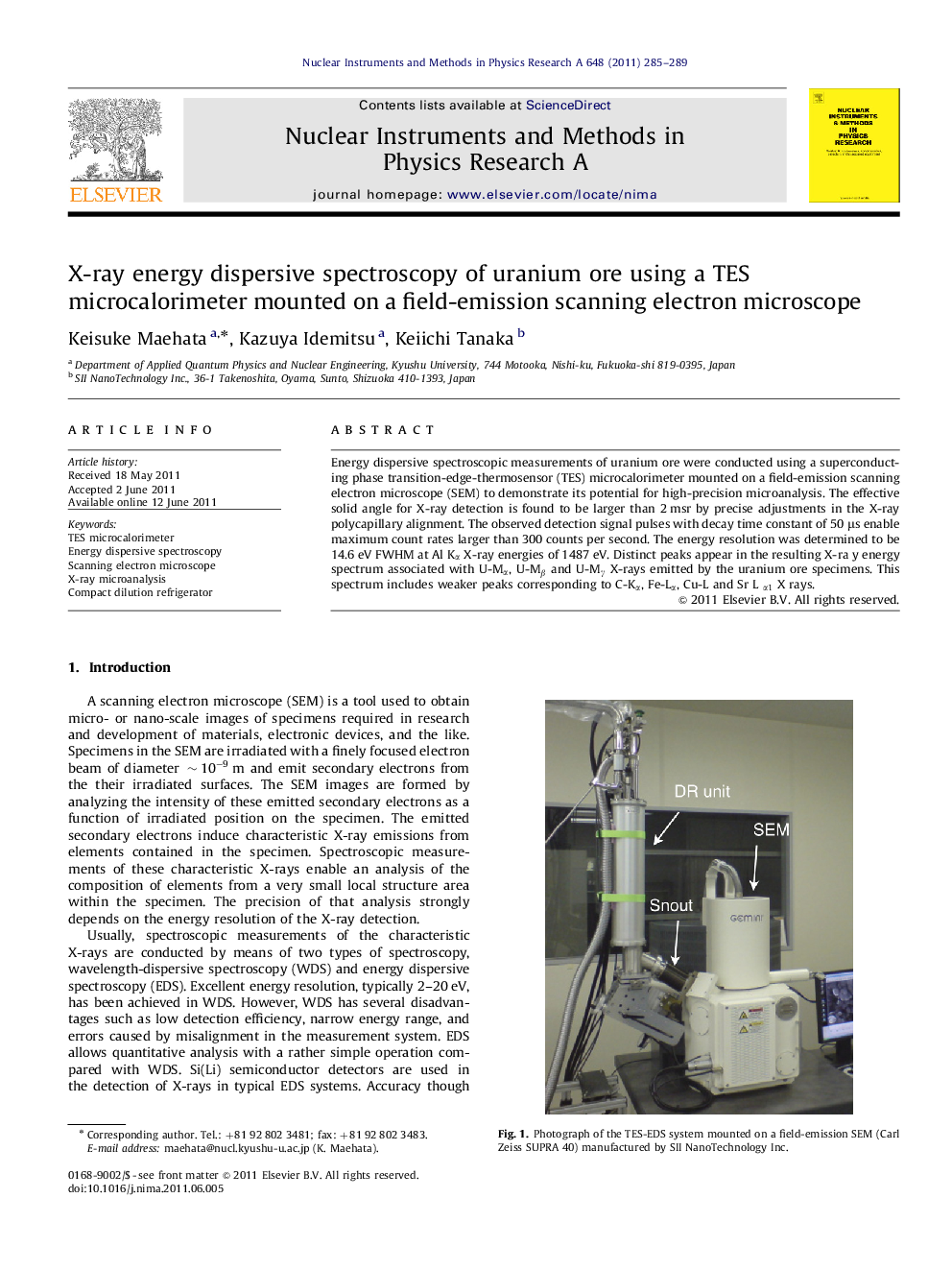 X-ray energy dispersive spectroscopy of uranium ore using a TES microcalorimeter mounted on a field-emission scanning electron microscope