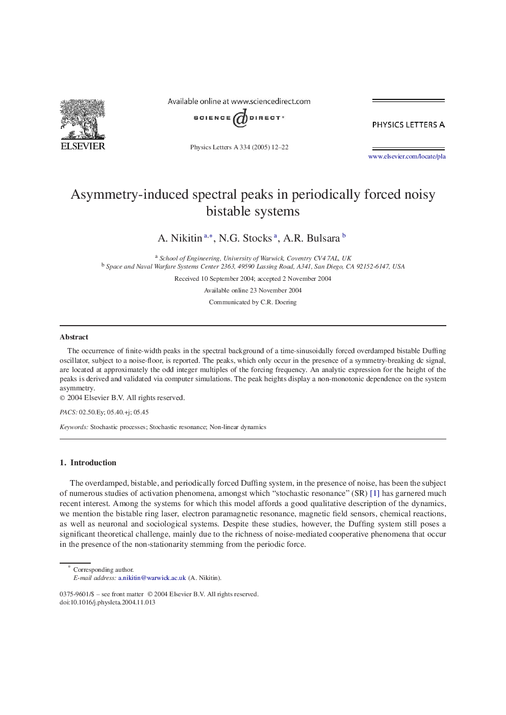 Asymmetry-induced spectral peaks in periodically forced noisy bistable systems